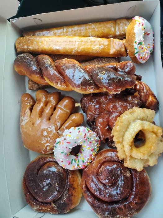 Box of Judy's donuts with different flavors