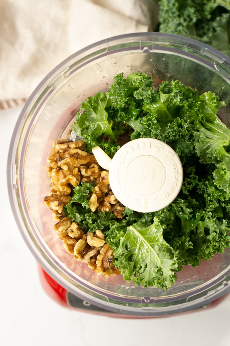 Kale and walnuts in a food processor
