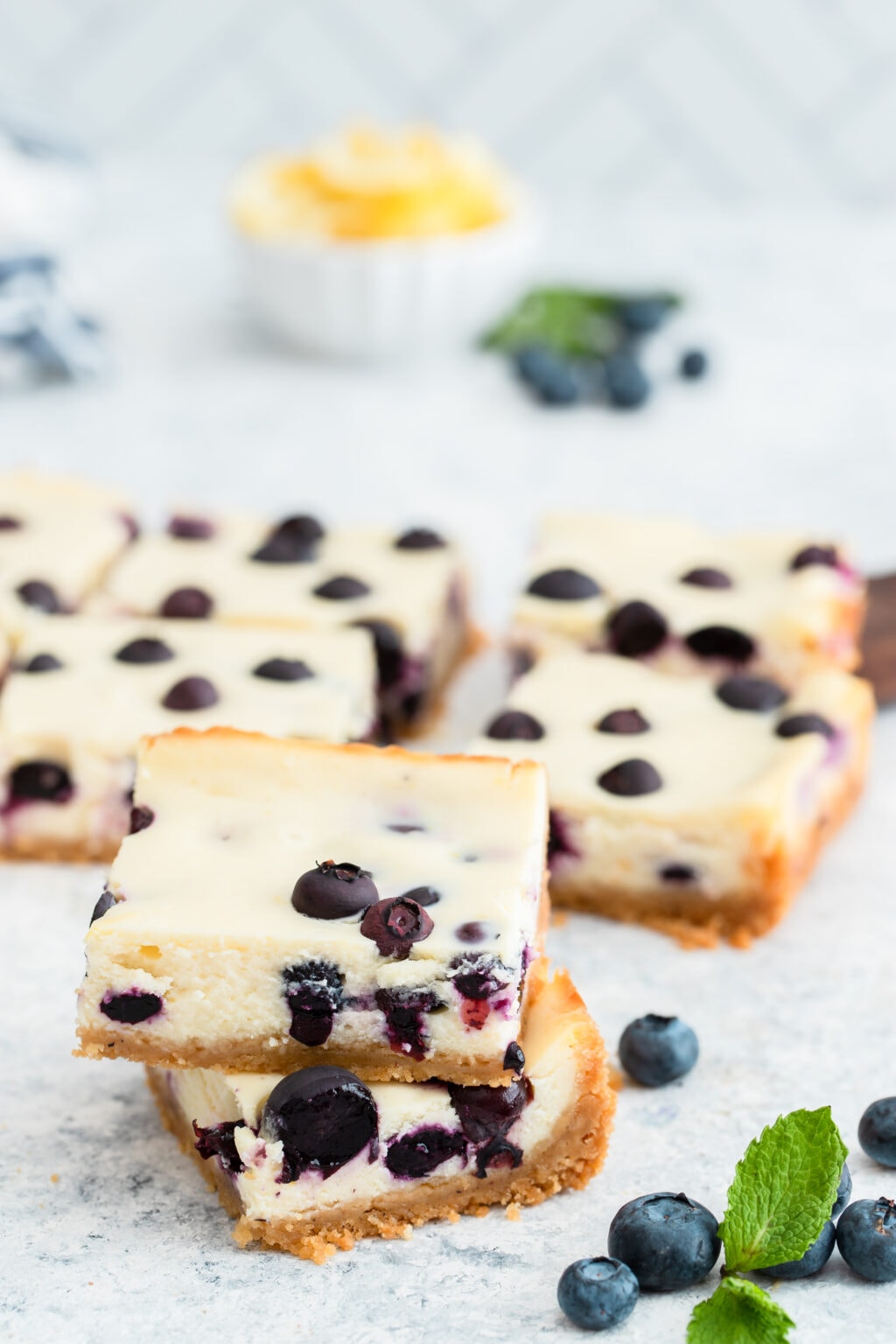 lemon blueberry cheesecake bars stacked