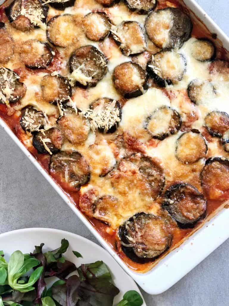 white pan of eggplant parmesan
