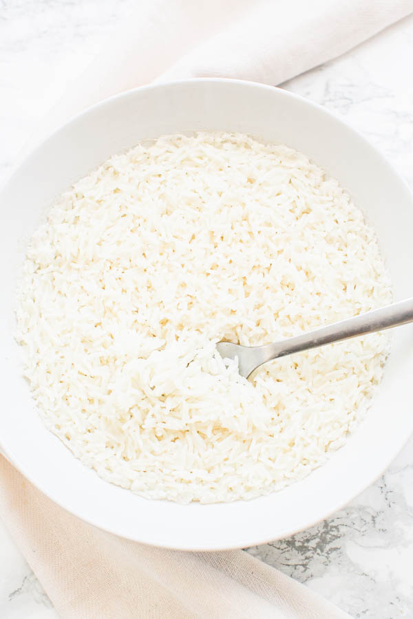 Basmati rice cooked in microwave and a fork
