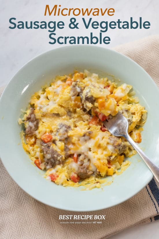 Microwave Sausage Scramble Recipe with Veggies | BestREcipeBox.com Microwave Sausage Scramble Recipe with Veggies in bowl with fork