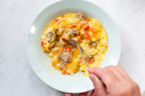 Stirring partially cooked eggs