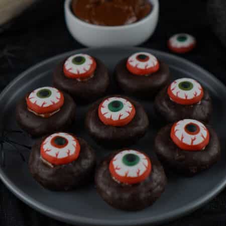 overhead view of plate of mini eyeball donuts