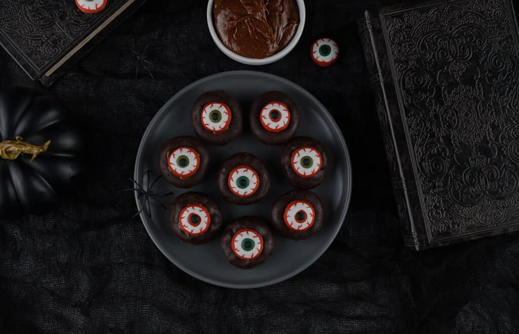 overhead view of plate of mini eyeball donuts