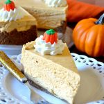 slice of pumpkin cheesecake on white plate