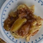 Old Fashioned Deep Dish Apple Pie recipe is an easy way to make apple pie.  This apple slab pie has no bottom crust, instead the apples are layered in a 9 x 9 inch baking dish with one crust layered over top.