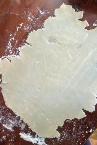 Old Fashioned Deep Dish Apple Pie recipe is an easy way to make apple pie.  This apple slab pie has no bottom crust, instead the apples are layered in a 9 x 9 inch baking dish with one crust layered over top.