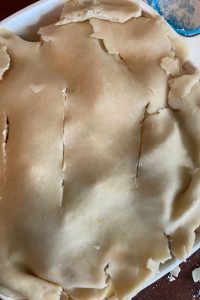 Old Fashioned Deep Dish Apple Pie recipe is an easy way to make apple pie.  This apple slab pie has no bottom crust, instead the apples are layered in a 9 x 9 inch baking dish with one crust layered over top.