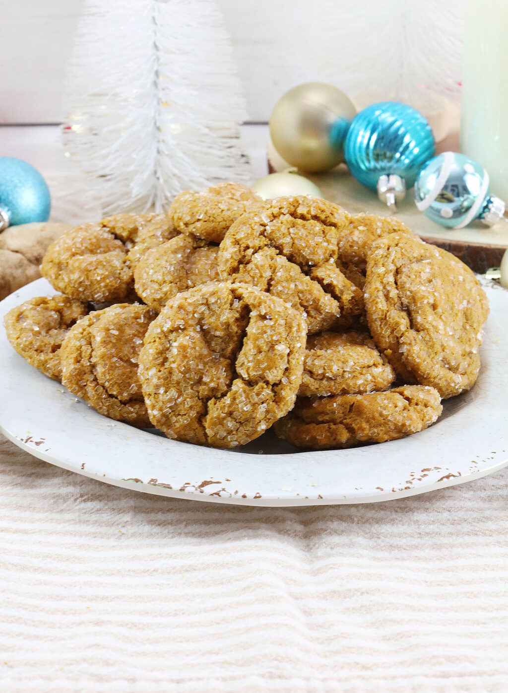 plate of freshly baked gingersnap cookies