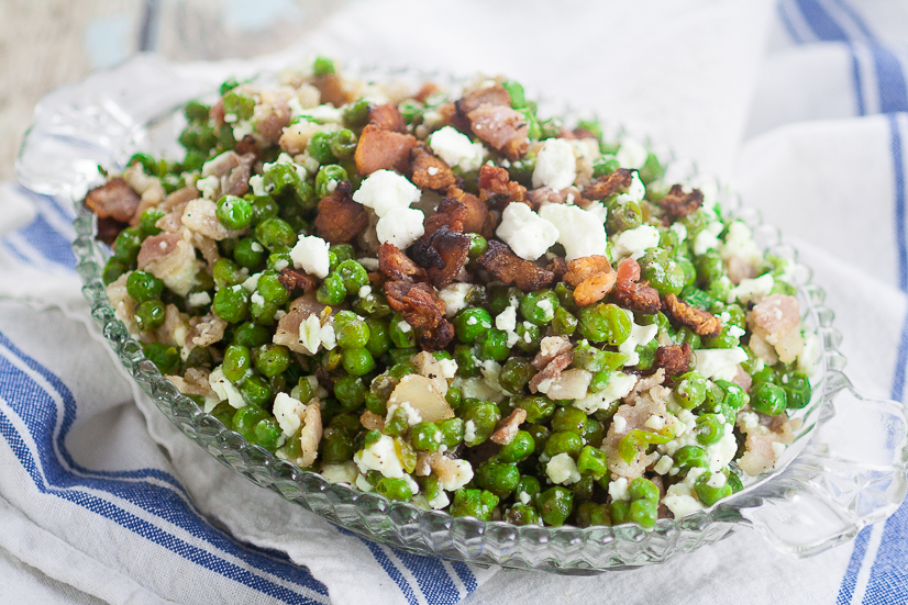 Feta Bacon Peas Recipe - Peas cooked with salty crunchy bacon then tossed with tangy, creamy Feta cheese for a delightful, unique side dish. Make this Feta Bacon Peas quick and easy side dish recipe in just 20 minutes!