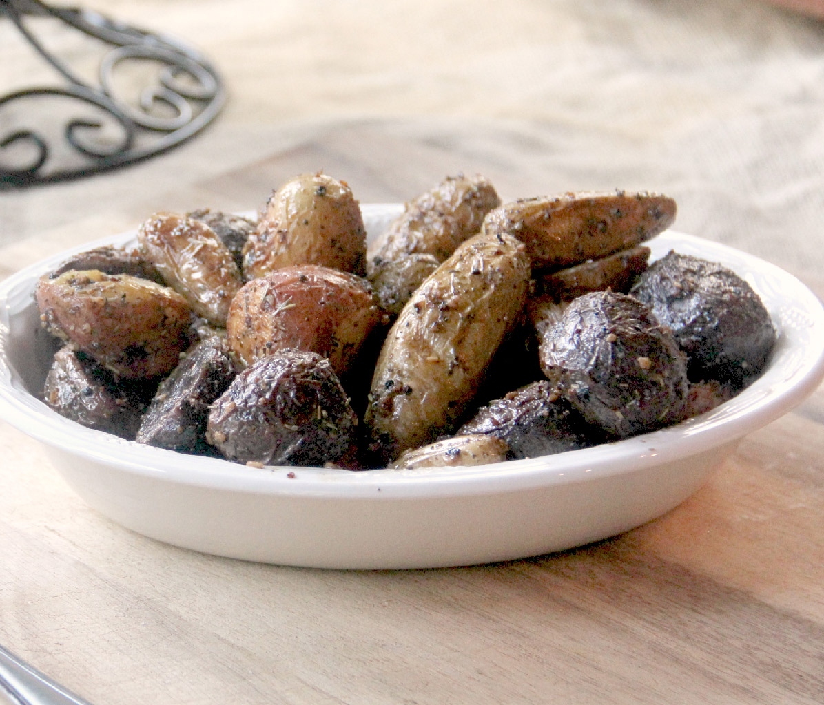 Roasted baby potatoes with garlic and Italian herbs are crispy on the outside and soft and fluffy on the inside. Easy to make!