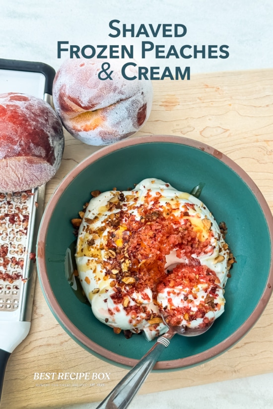 spoon in the bowl of frozen peaches and cream 