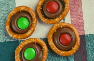 Hersey Kiss Pretzels are a favorite holiday treat.  These simple Pretzel Kiss Candies are incredibly easy to make and always a hit with family and friends.  