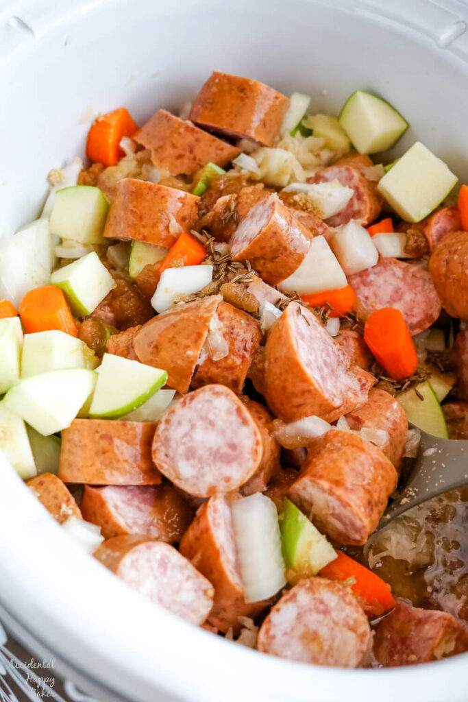The brown sugar, caraway seeds and apple juice are poured over the top. 