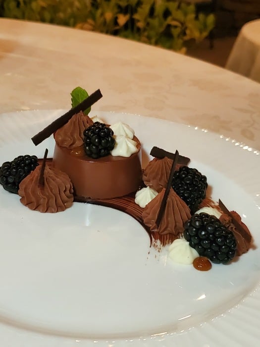 Decadent chocolate dessert on a white plate