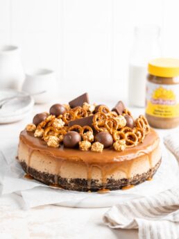 SunButter Cheesecake features a chocolate pretzel crust and is topped with a salted caramel sauce