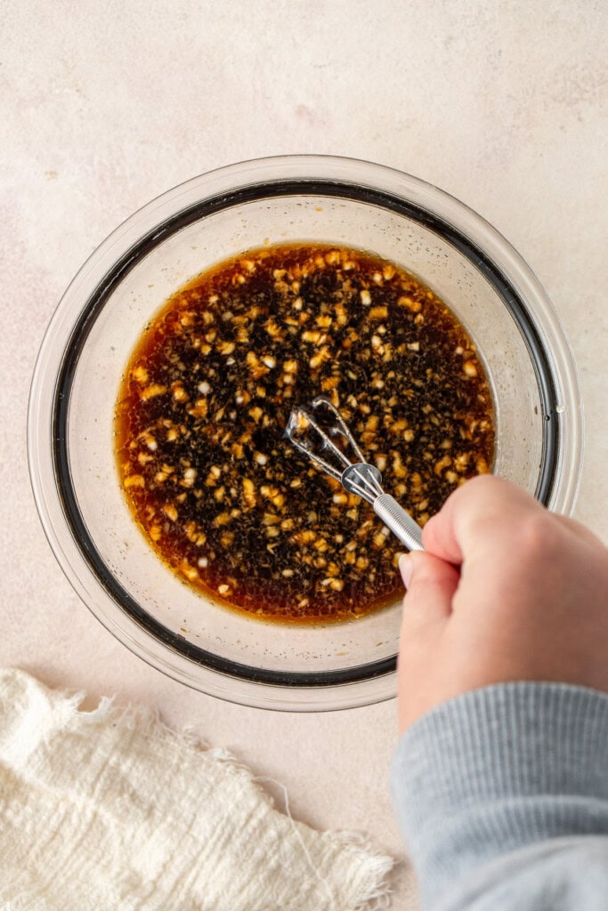 Mixing up the teriyaki sauce in a small bowl.