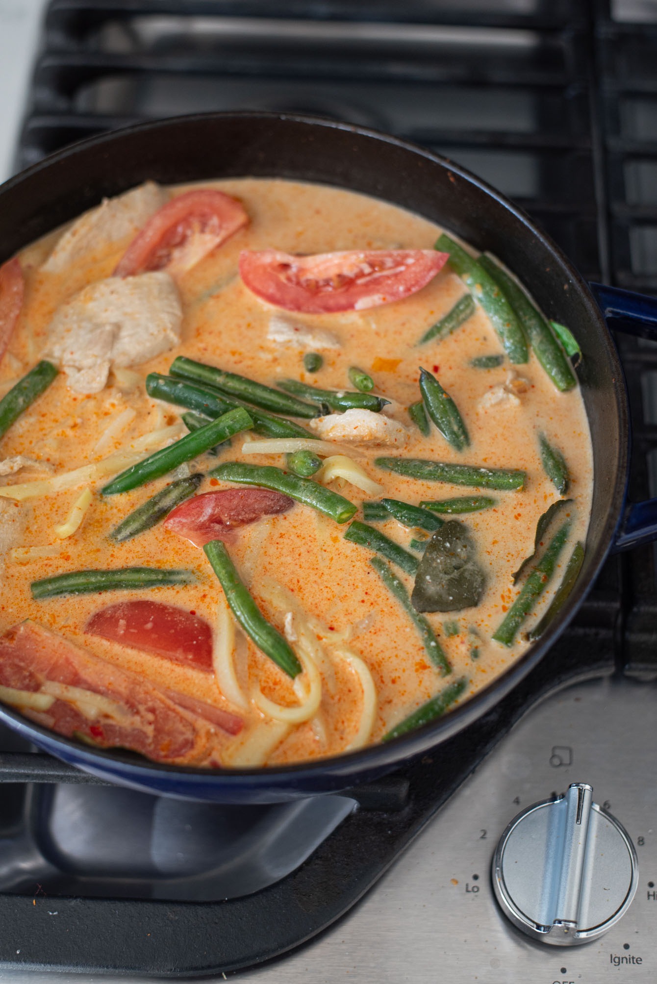 Coconut milk added chicken and vegetables.