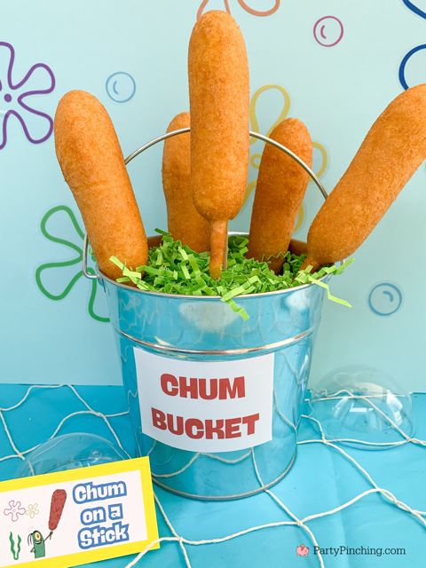 Chum on a stick corn dogs,  spongebob theme party, best easy spongebob party ideas, cute creative spongebob party ideas, chocolate bars, kelpo cheesecake cups, best spongebob doodle bob cake, chum bucket chum on a stick, sandy's tree dome moon pies