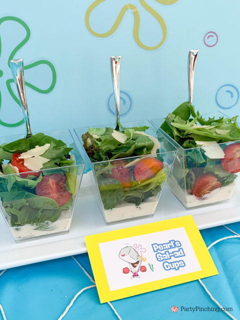 Pearl's Salad, spongebob theme party, best easy spongebob party ideas, cute creative spongebob party ideas, chocolate bars, kelpo cheesecake cups, best spongebob doodle bob cake, chum bucket chum on a stick, sandy's tree dome moon pies