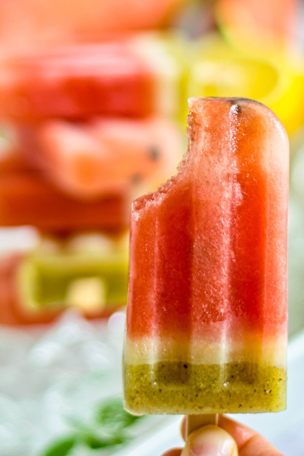 bite taken out of a homemade watermelon popsicle