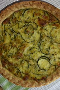 Zucchini Quiche is a great dish year round, but especially when the zucchini is plentiful from the garden or farmers' market. This easy zucchini quiche recipe, made with homemade crust, frozen pie crust or crustless, can be a great breakfast or brunch option.