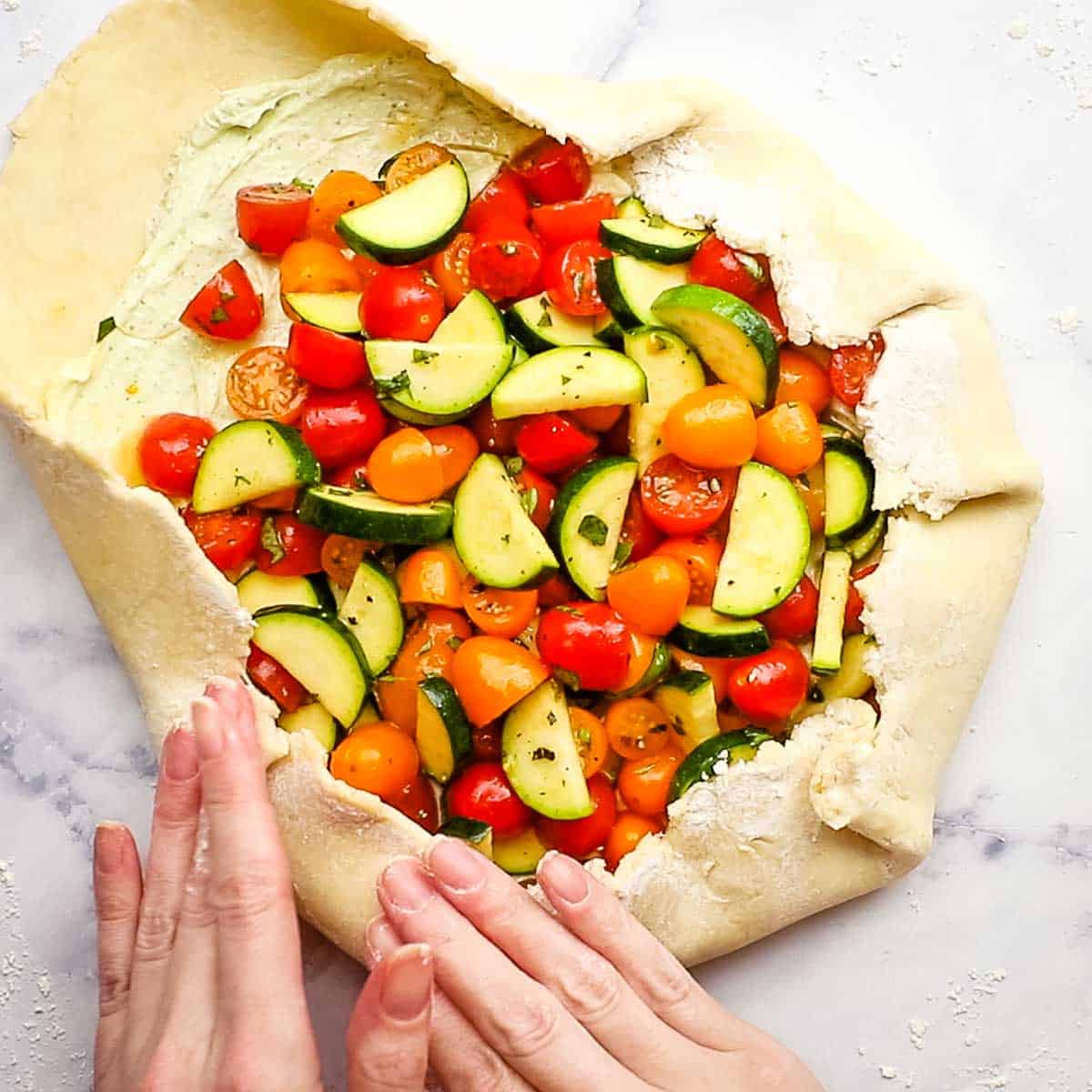 folding the pie dough from the sides