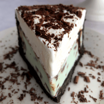 a slice of oreo mint ice cream pie on a plate