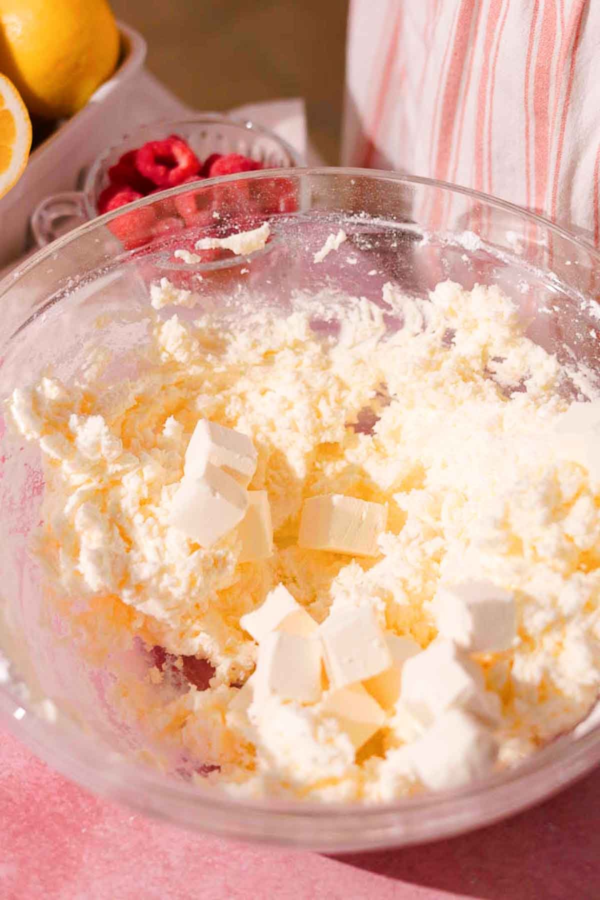 adding cubed cream cheese to frosting