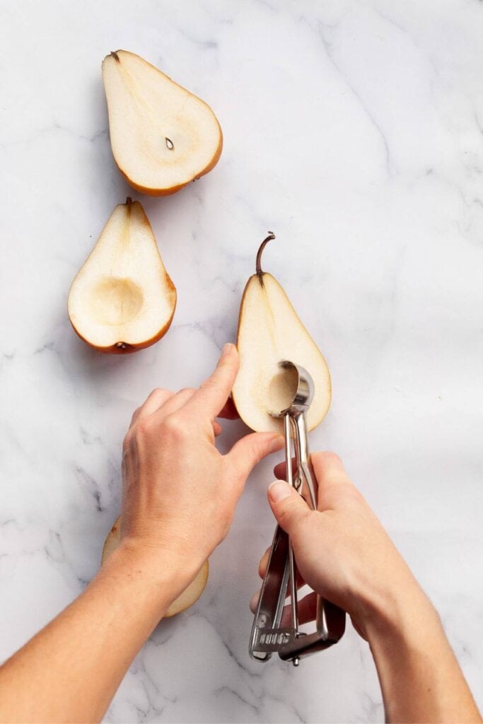 taking the core and seeds out of a pear