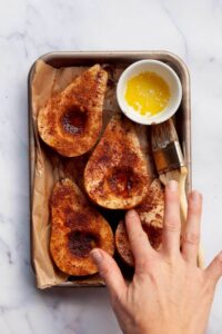 rubbing coconut sugar and butter onto cut-side of the pears before air frying