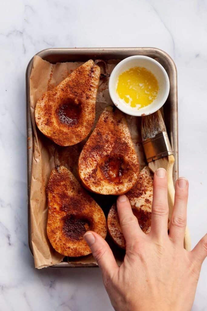 rubbing coconut sugar and butter onto cut-side of the pears before air frying