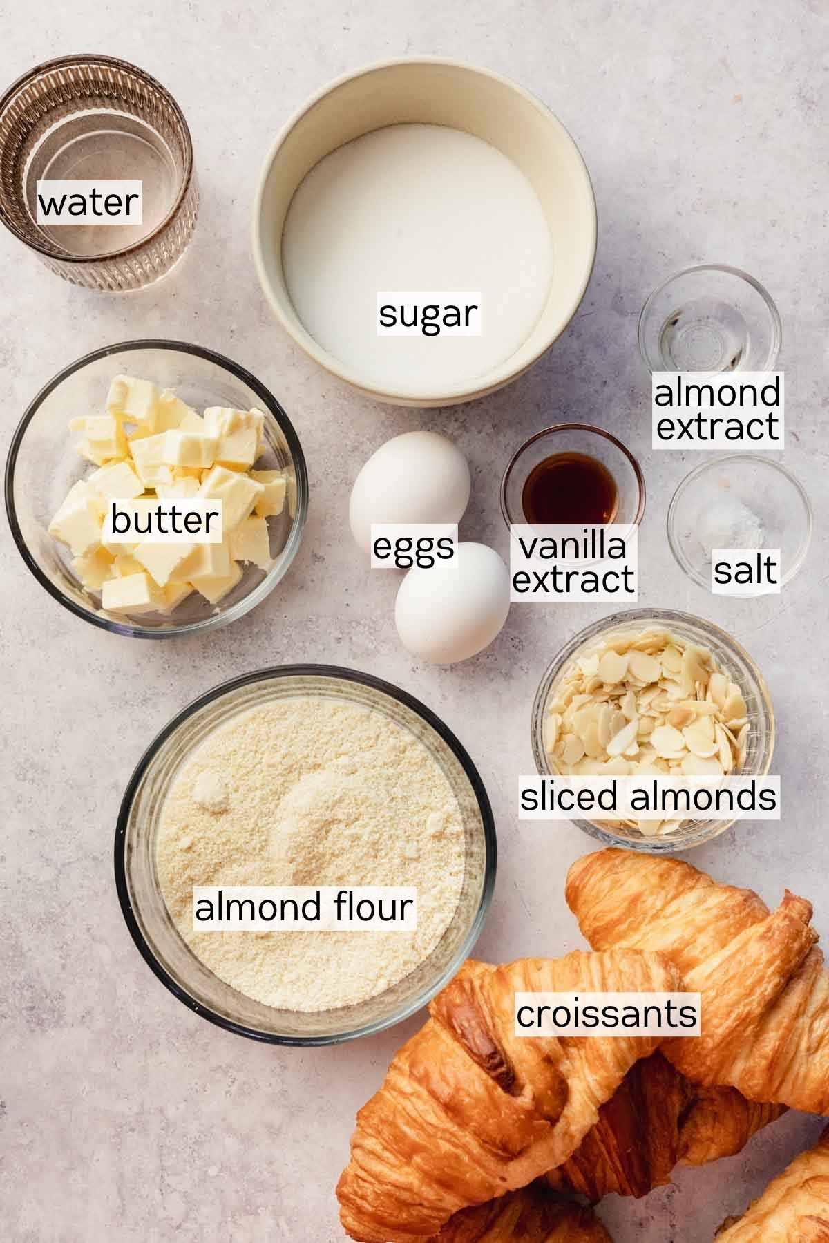 ingredients for almond croissants in little bowls