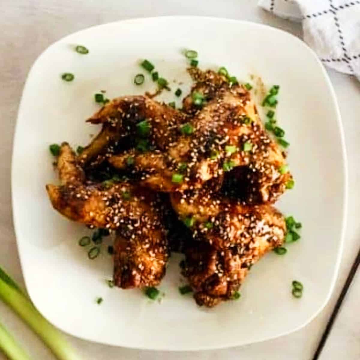 baked chicken wings with asian sauce.