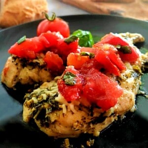 baked chicken with bruschetta.