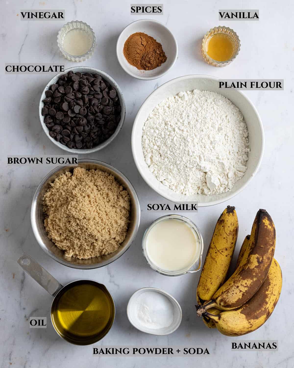 A labelled photot of the ingredients needed to make vegan banana bundt cake.