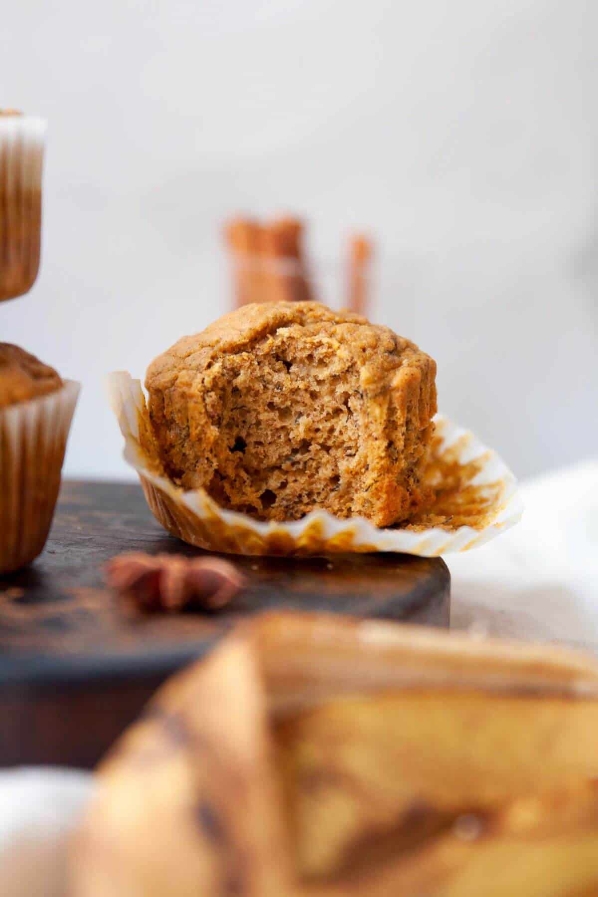 Fluffy healthy banana pumpkin muffin with a soft crumb.