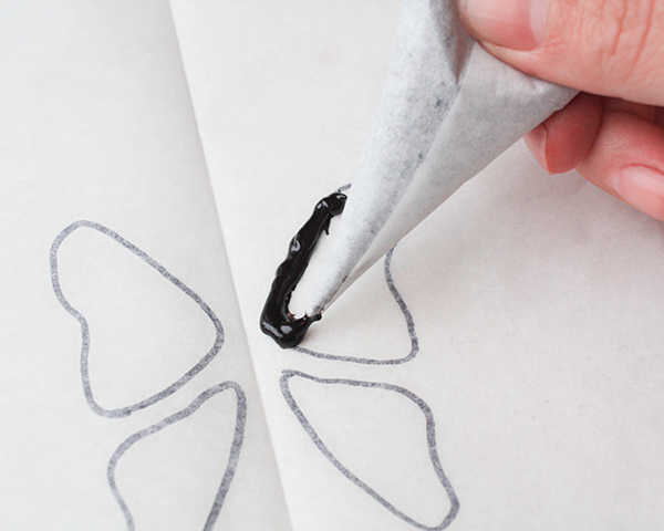 How to make a creepy-cool Black Butterfly Cake for Halloween! | Erin Gardner for TheCakeBlog.com