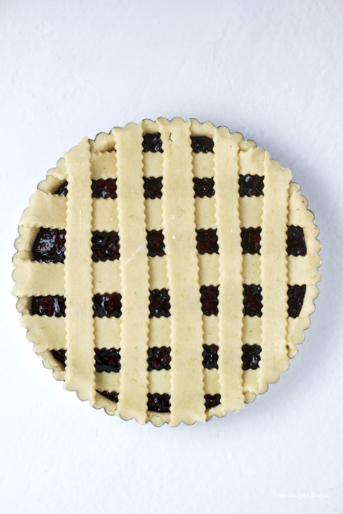 unbaked crostata with lattice top