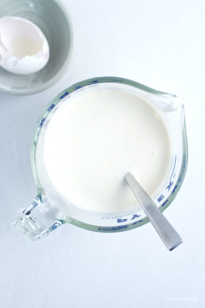 wet ingredients mixed in a spouted measuring cup