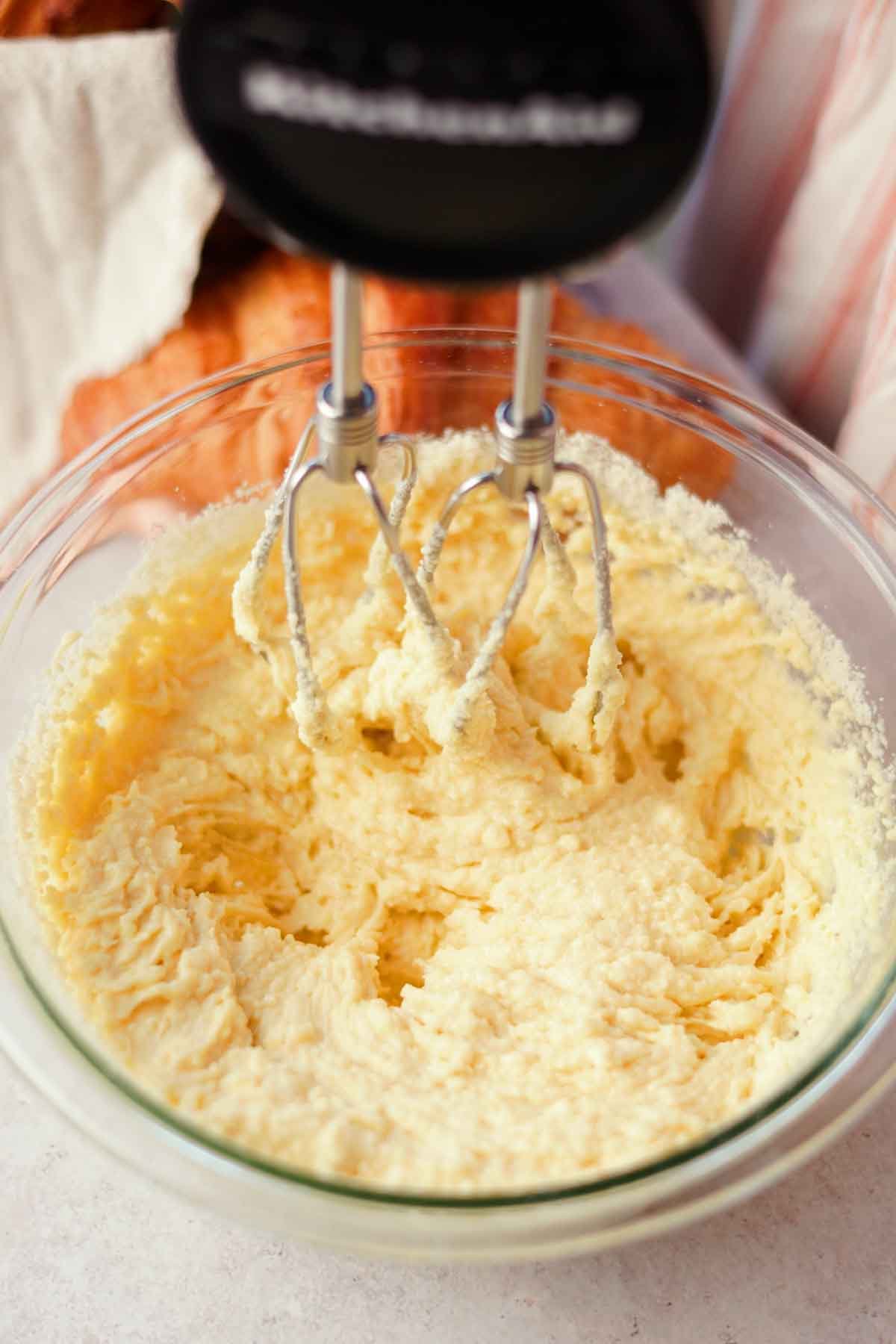 blending frangipane filling with handheld electric mixer