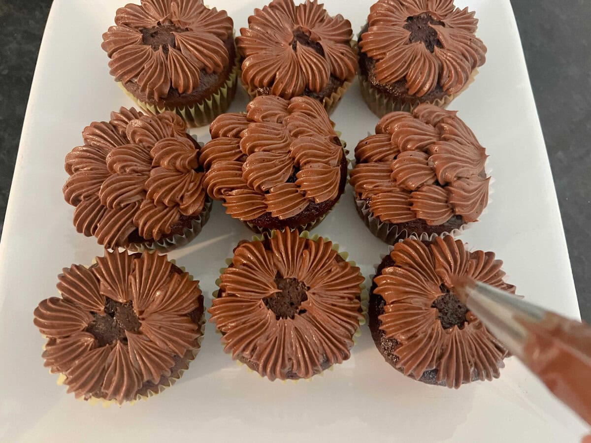 Decorating the Brownie Cupcakes.