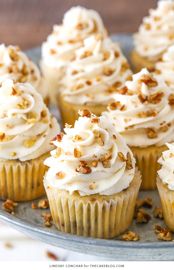 Butter Pecan Cupcakes - moist vanilla cupcakes studded with toasted butter pecans and topped with cinnamon buttercream frosting | by Lindsay Conchar for TheCakeBlog.com