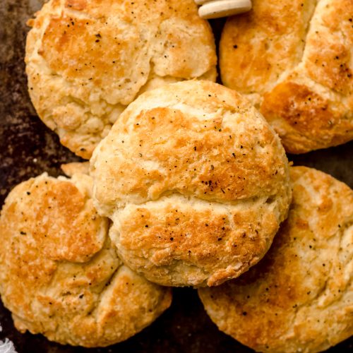 aerial photo of buttermilk biscuits on a baking sheet