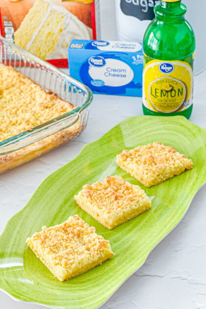 lemon bars with cream cheese filling made using a lemon cake mix