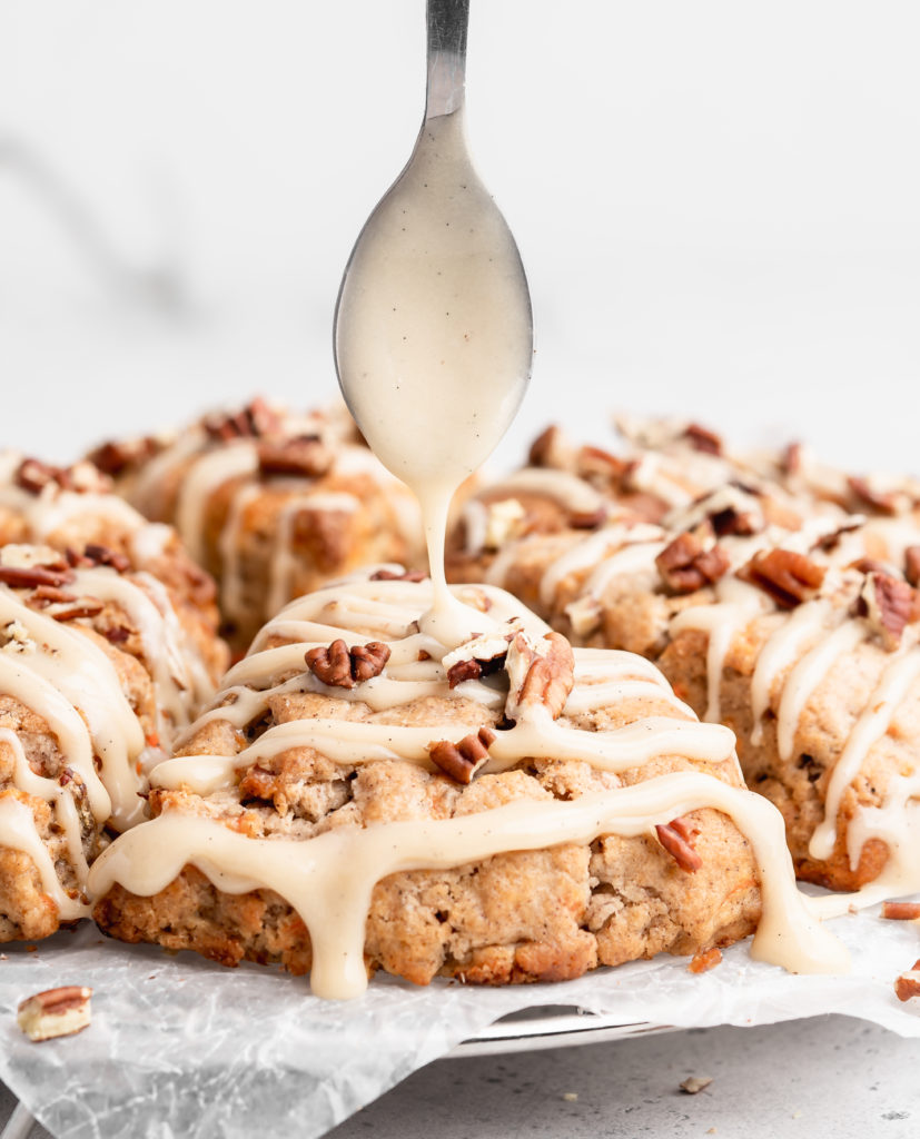 These carrot cake cones are sweet, heart warming, and delicious! With pecans and maple cream cheese glaze