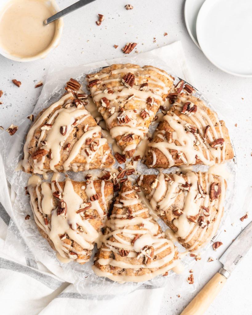 These carrot cake cones are sweet, heart warming, and delicious! With pecans and maple cream cheese glaze
