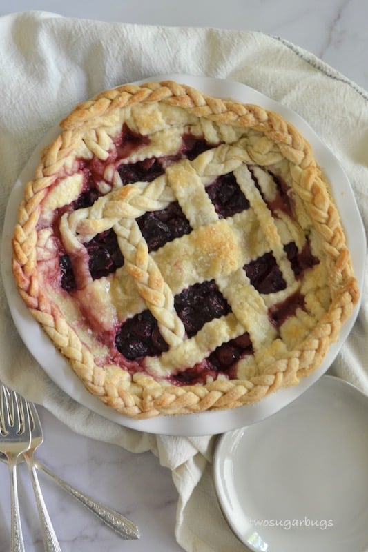 Overhead shot of blackberry cherry pie.