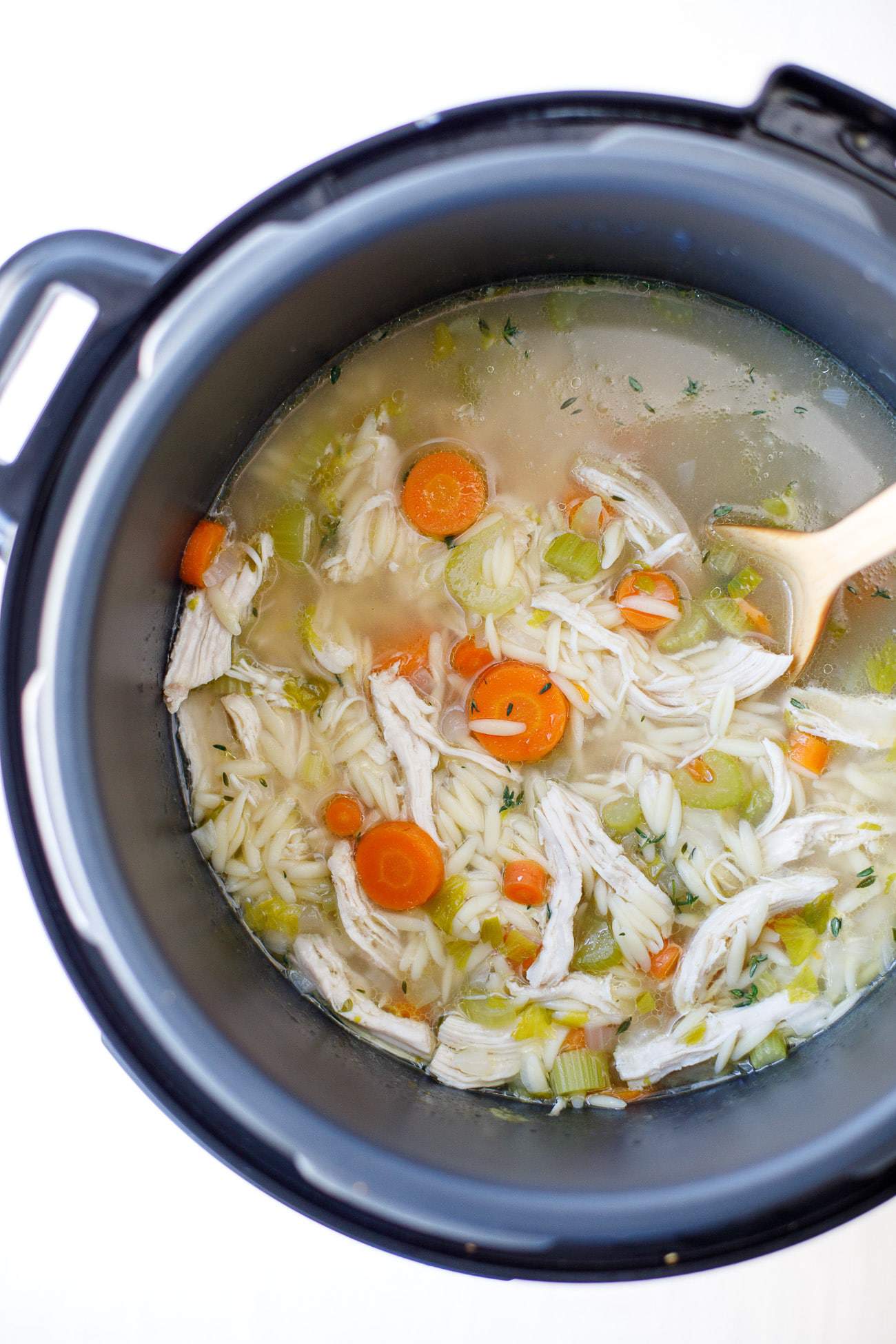 Pressure Cooker Chicken Orzo Soup Recipe - This easy and delicious chicken orzo soup is a wonderfully healing and comforting family dinner. #PressureCooker #CrockPot #ChickenOrzoSoup
